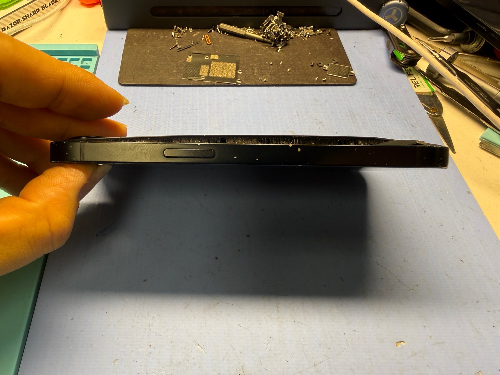 When a Battery Swells, the Glass Goes With It — iPhone 16e Swollen Battery + Back Glass Replacement in LA