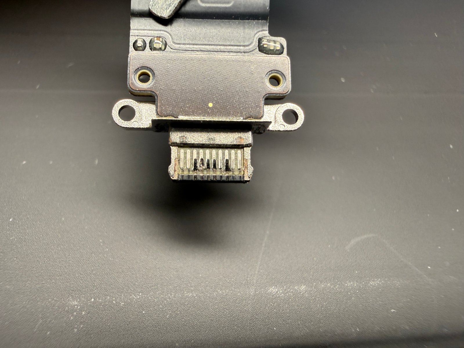 Apple Said "Board Fault, Can't Be Repaired." It Was the Charging Port.