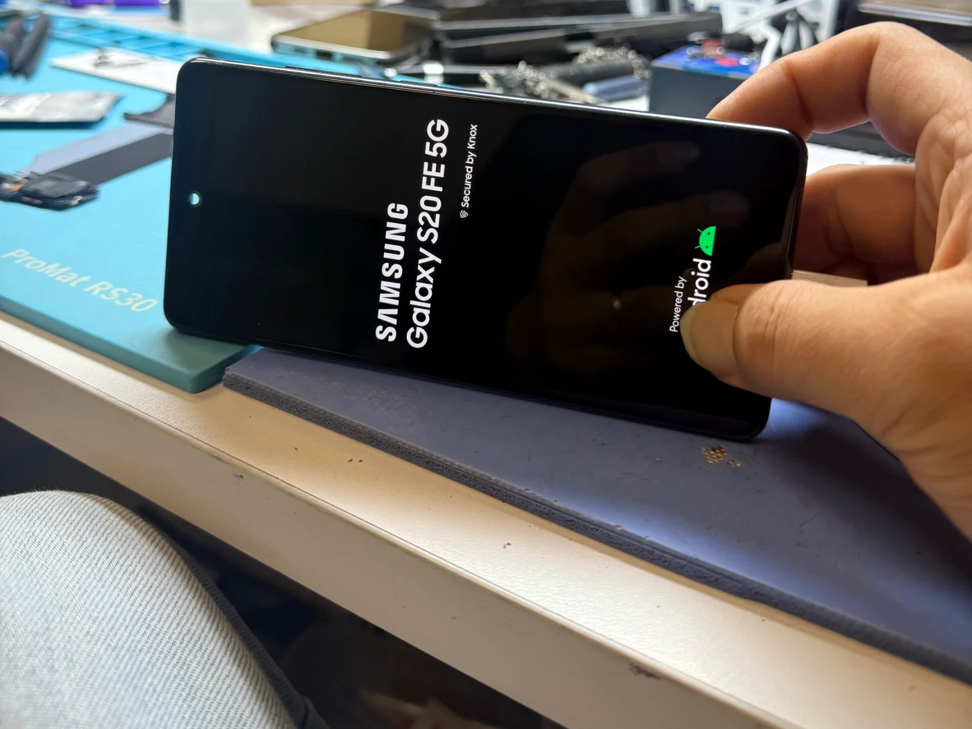 Samsung Galaxy S20 FE 5G showing the boot logo after charging port and flex cable replacement