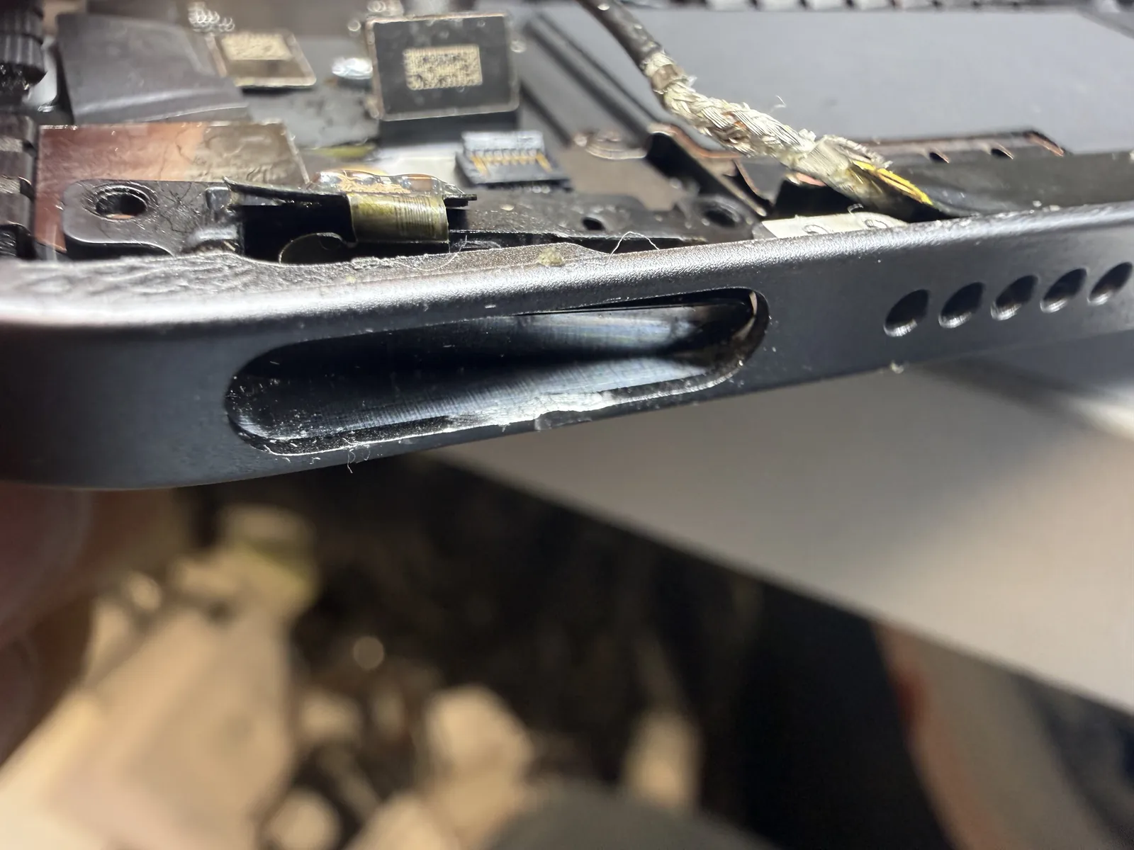 The iPad Air 4 button channel after reshaping, smooth and clear from the inside