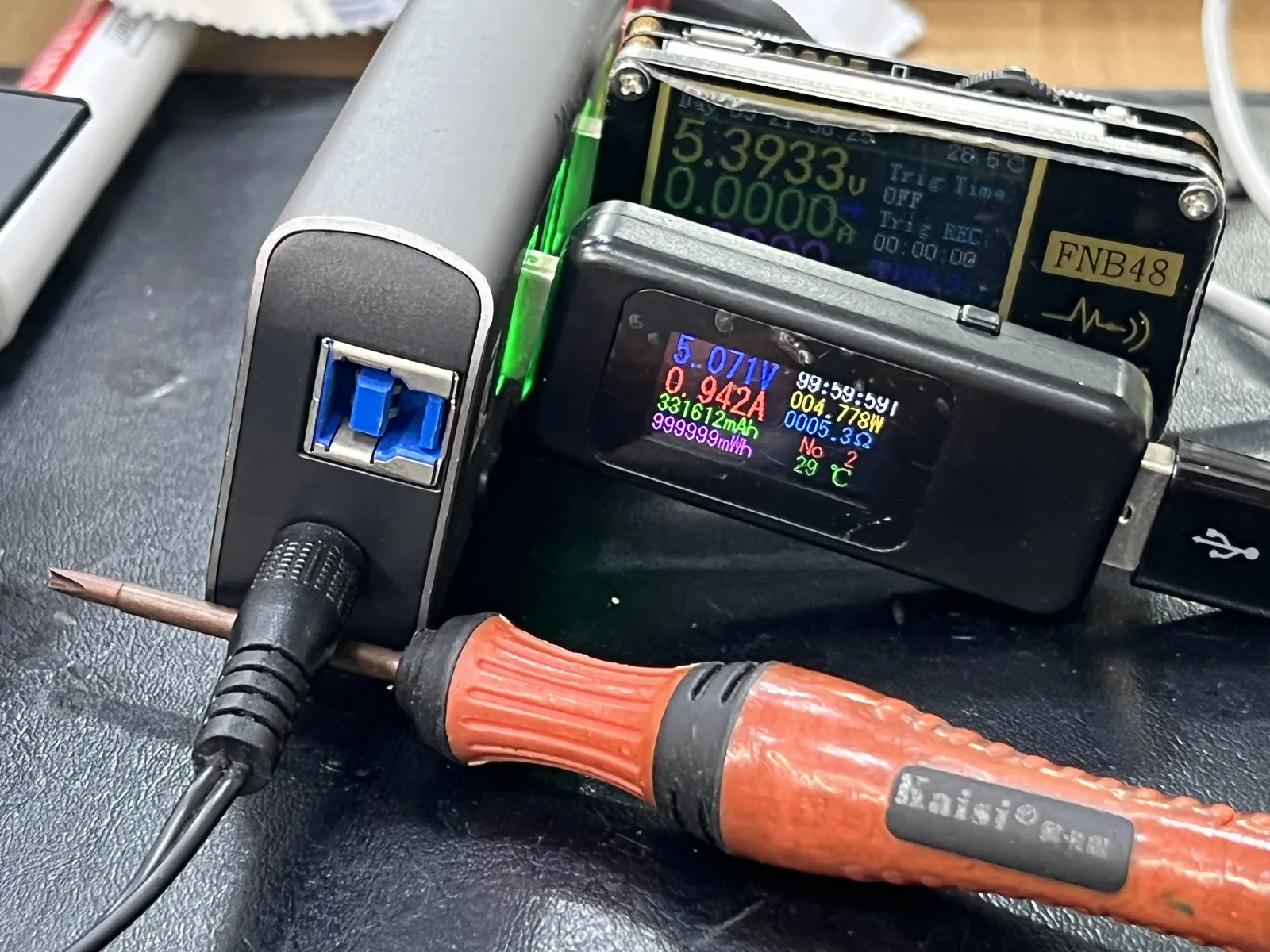 Charging voltage measured on the iPad Air 4 to confirm the connector repair