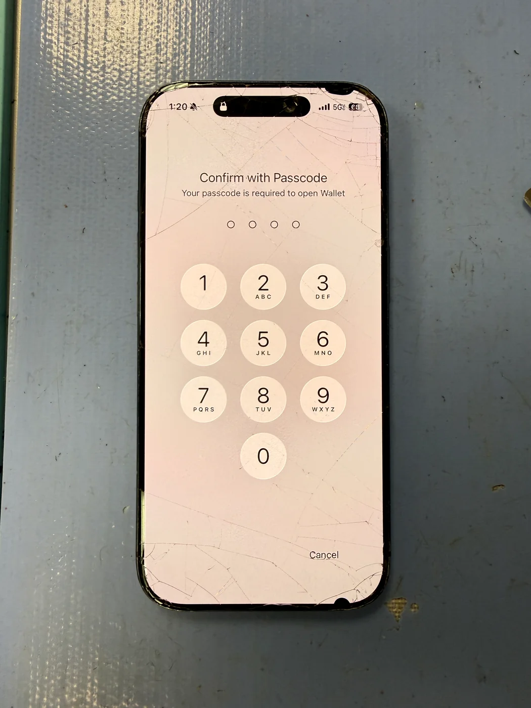 Cracked iPhone 17 Pro before OLED screen replacement