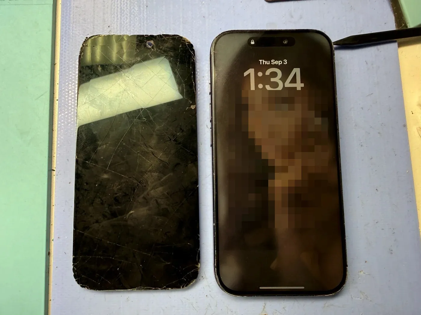 Before and after: the shattered iPhone 17 Pro screen next to the phone with its new OLED fitted