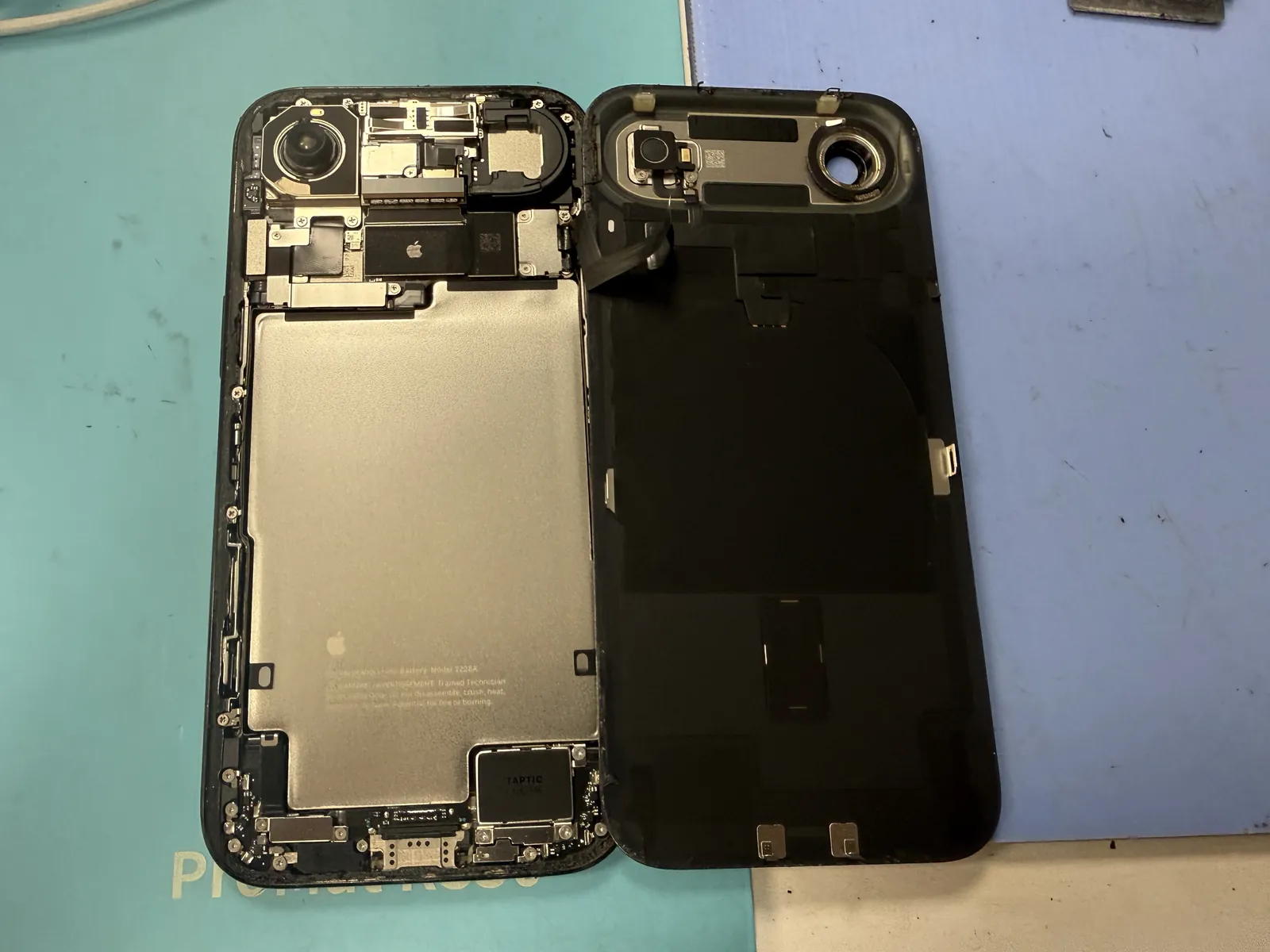 iPhone Air opened through the back glass to reach the rear camera