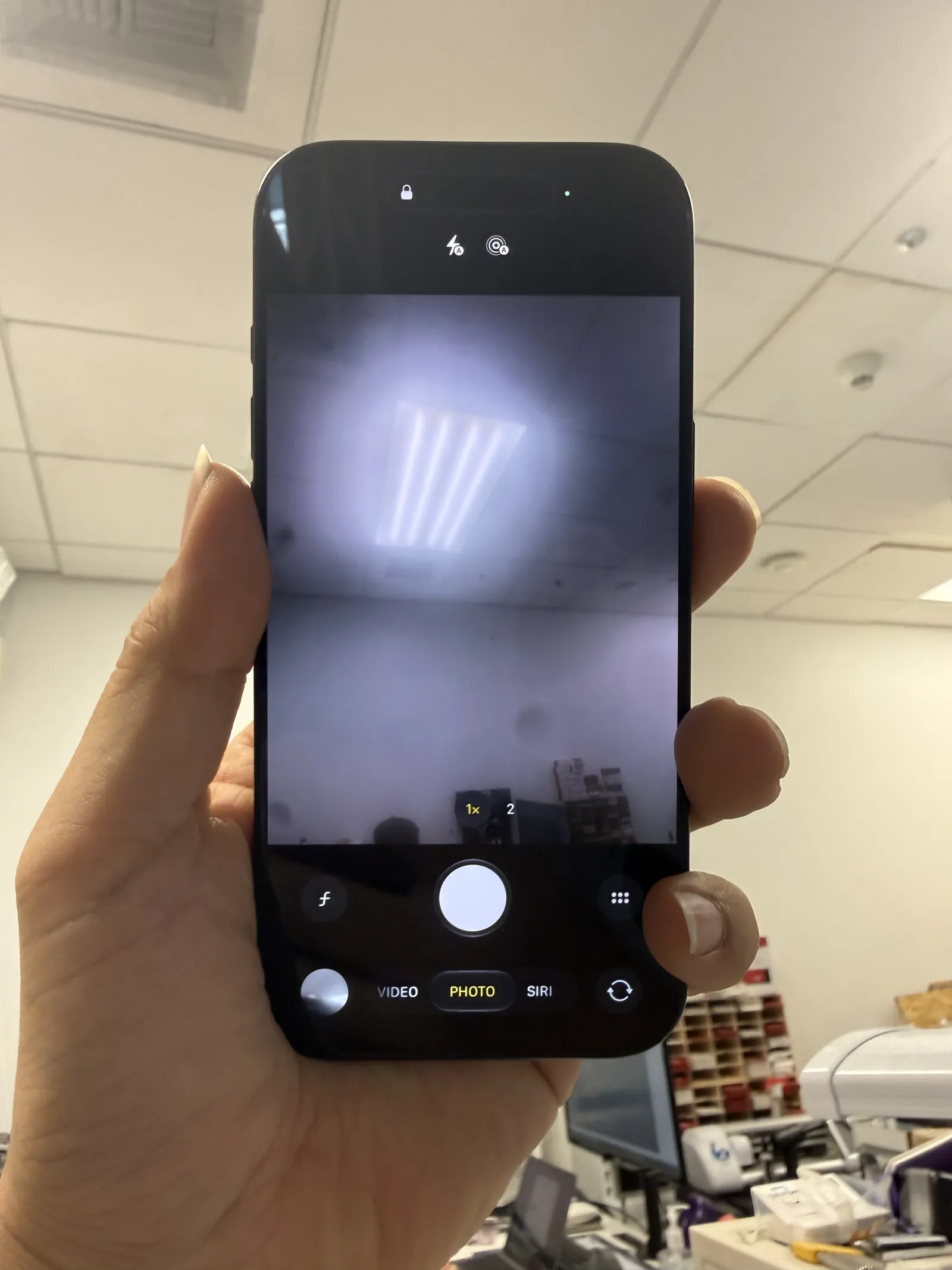 iPhone Air camera app showing a hazy, blurry live view — the symptom as it came in