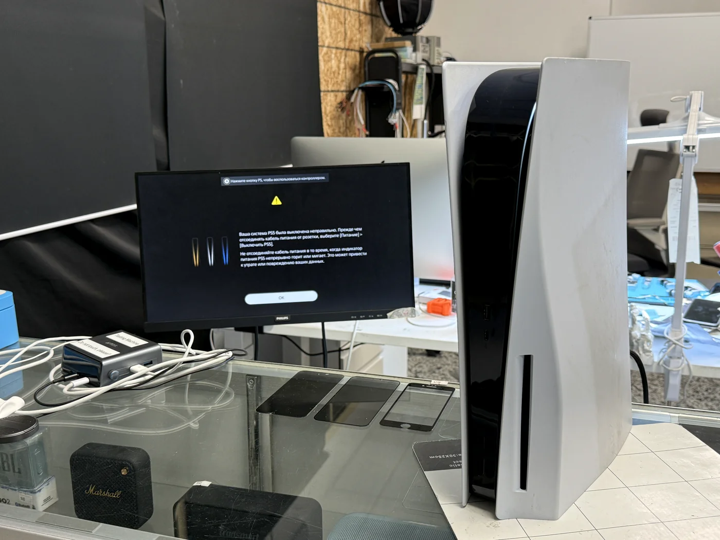 PS5 booting to a picture on the test monitor after HDMI port repair at FIXSTORY in Downtown Los Angeles