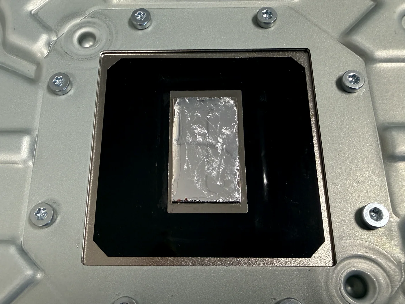 Fresh liquid metal applied to the PS5 heatsink contact plate